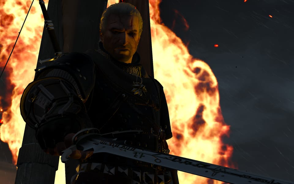 Screenshot of Geralt about to stick a sword into you.