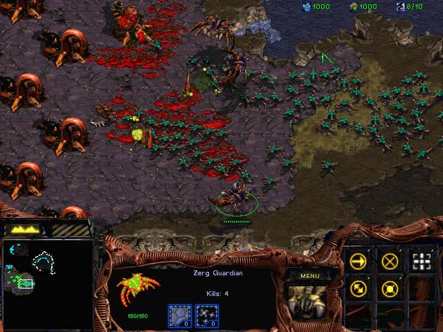 Screenshot of StarCraft Insurrection, showing a massive Zerg attack on a Zerg base.