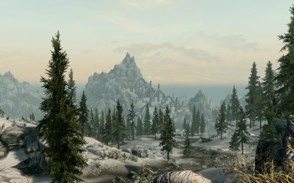 Skyrim's initial wow, look at that moment, with Bleak Falls Barrow in the distance.