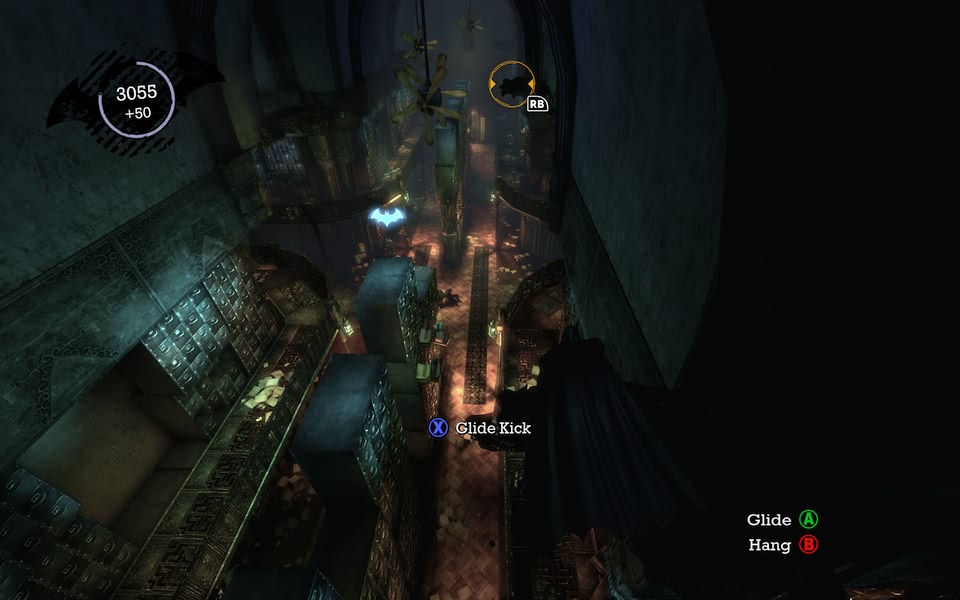 Screenshot of Batman perching on a gargoyle in a dark corner.