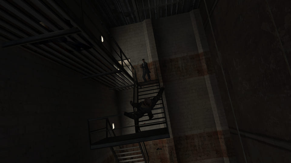 Screenshot of Max Payne finishing off a mobster falling off a fire escape.